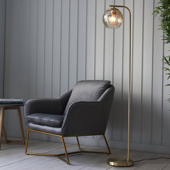 image of satin brass curved floor lamp with champagne dimpled glass shade