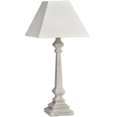 cut out image of sculpted washed wood white lamp with linen shade