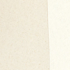 close up on grain of cream linen lamp shade