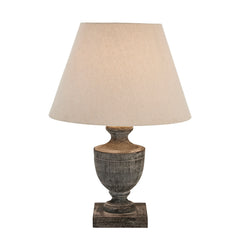 cut out image of brown urn shaped table lamp with linen shade
