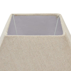 close up image of fluted washed wood table lamp with linen shade