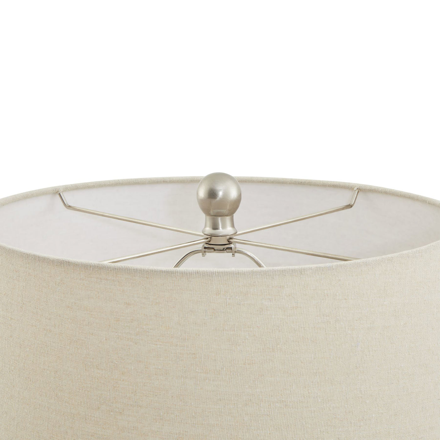 close up on top of cream coloured fabric lampshade