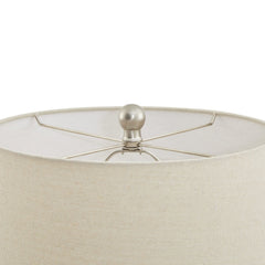 close up on top of cream coloured fabric lampshade