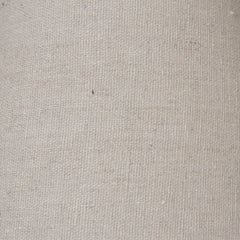 close up image of natural coloured linen shade on top of weathered-grey lamp
