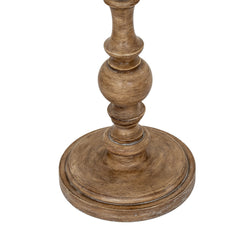close up on brown base of floor lamp with rustic effect and curved details