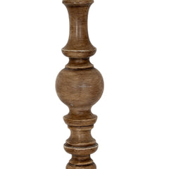 close up on brown wooden body of floor lamp with curved details