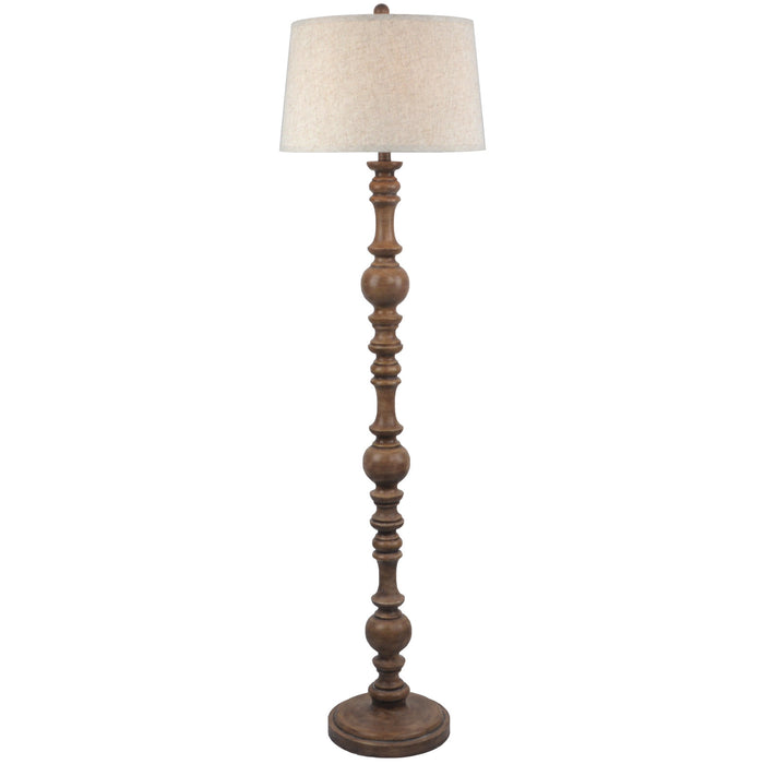 image cut out on white background of brown rustic floor lamp with traditional edged linen shade