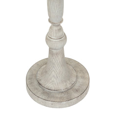 close up image of white resin base of lamp, with distressed quality