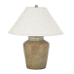cut out of mottled green lamp with linen shade