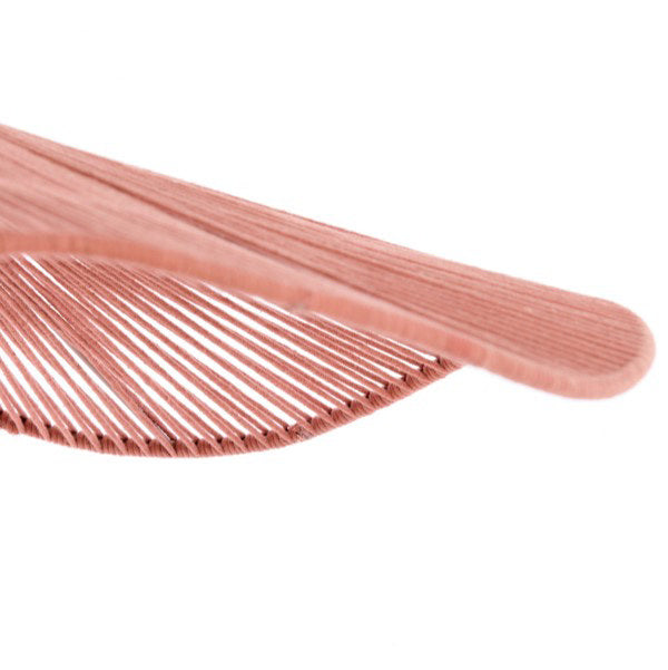 close up image cut out on white background of edge of woven shade, highlighting unique wavy shape