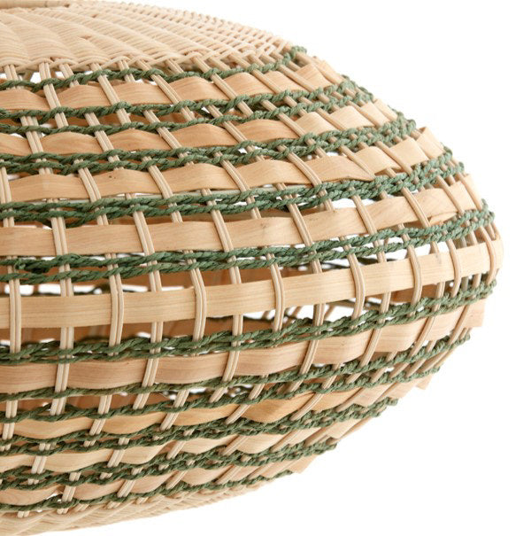 close up image of side of hanging oval light shade in natural and green colours