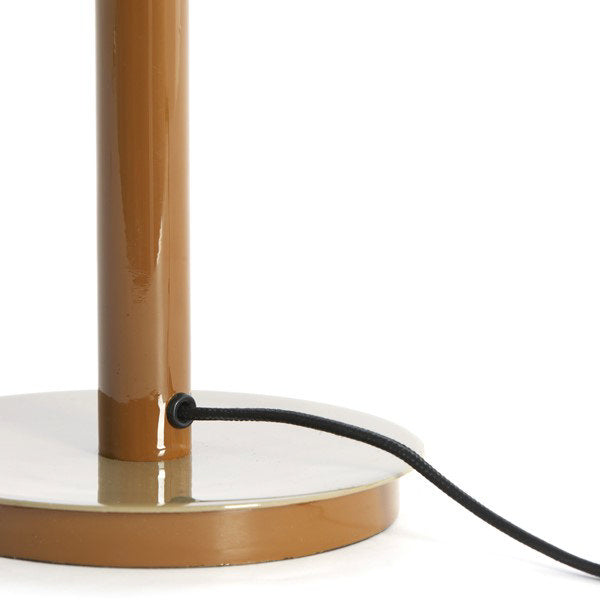 close up image of body and circular base of brown iron lamp with glossy sheen