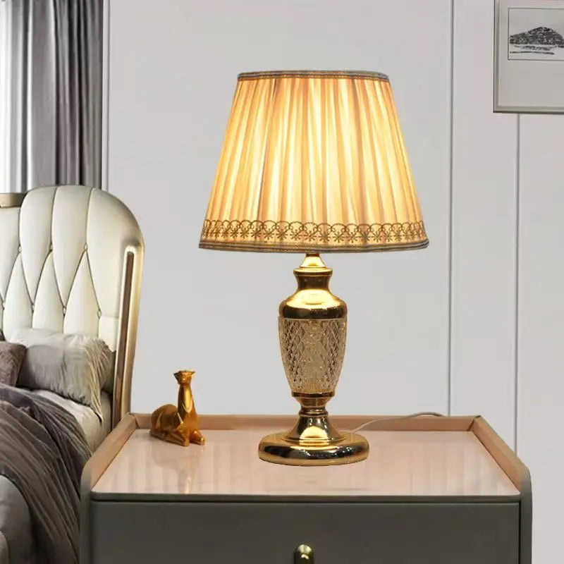 Gold and Brass Table Lamp, Pleated fabric shade in golden tan with a lace-edged hem, Turned Brass Baluster Base, Bedside & Console