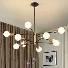 Black and Brass 8 Light Sputnik Chandelier, Asymmetric Rods with Exposed Globe Bulbs, Central Brass Hub, Dining Room & Living Room