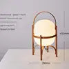 Bent Peach Frame Lantern Floor Lamp, Opal Glass Shade, Curved Carry Handle, Splayed Tripod Legs, Living Room & Bedroom