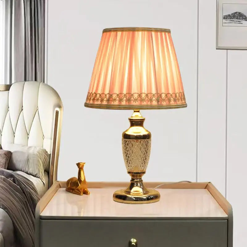 Gold and Brass Table Lamp, Pleated fabric shade in blush pink with a lace-edged hem, Turned Brass Baluster Base, Bedside & Console