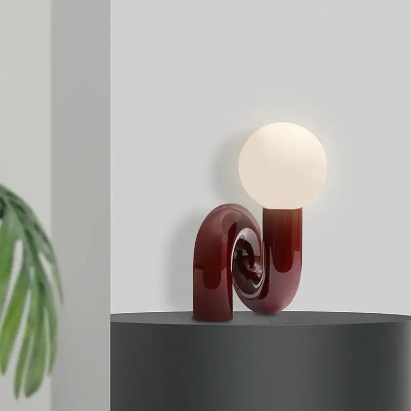 Sculptural Pink Curved Table Lamp with an Opal Glass Sphere Shade, Glossy Lacquer Finish, Console & Living Room