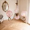 Pink Glass Globe Cluster Chandelier, Blush Pink Spheres on Scrolled Brass Arms, Chain Suspension, Dining Room and Hallway