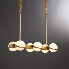 Opal Glass Globe Linear Bar Chandelier, Bisected Brass Frame, 10 Lights, Rope Hung, Dining Room & Living Room