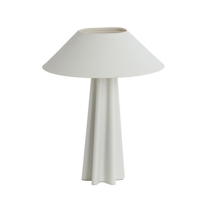 image cut out on white background of matt white lamp with sculptural body
