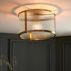 wider shot of ribbed glass ceiling light with antique brass