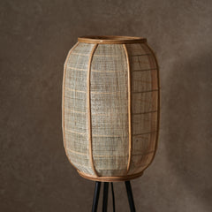 close up on linen and wooden shade of boho floor lamp