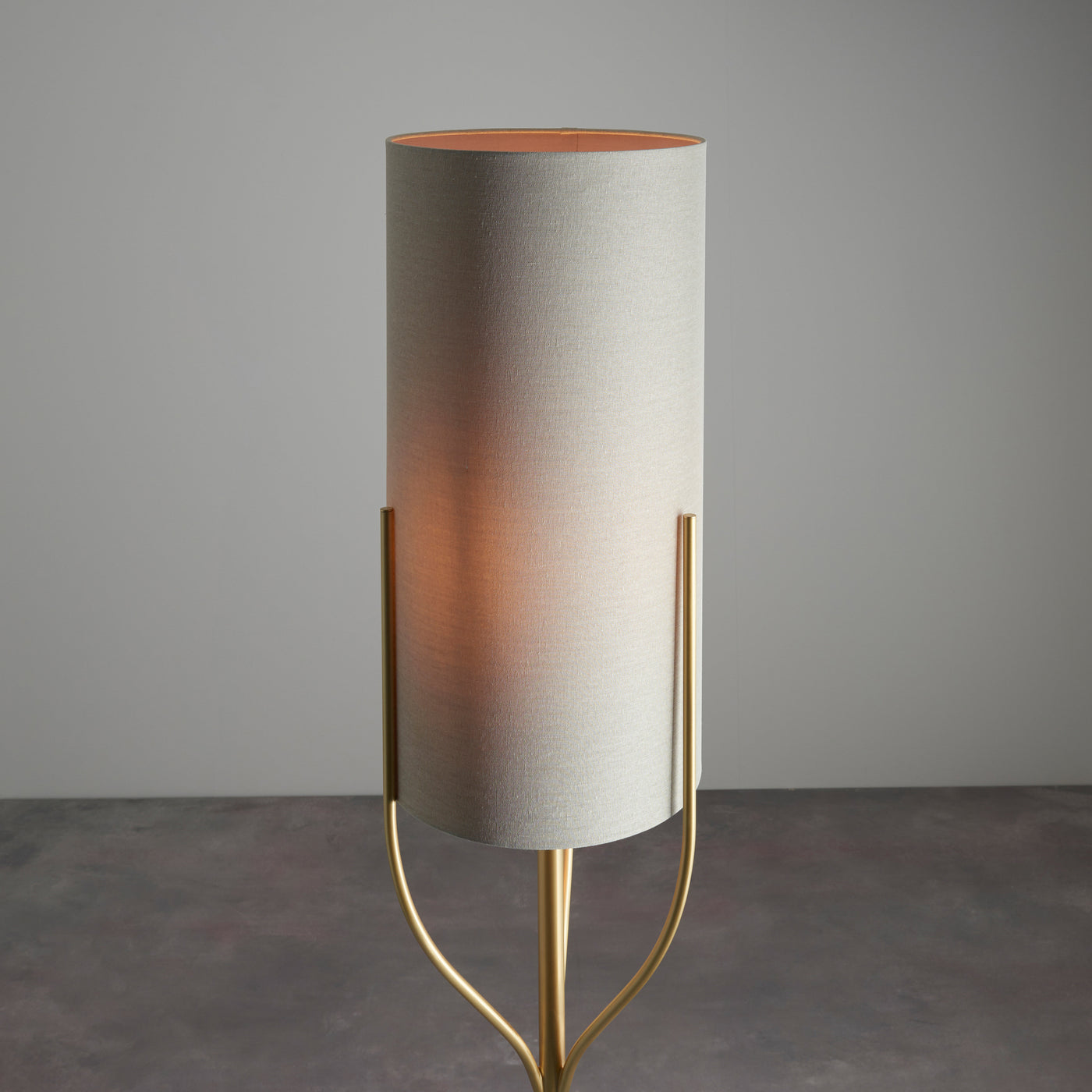 close up image on rectangular linen-effect shade of tall floor lamp