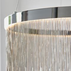 close up on chrome tasselled ceiling pendant light