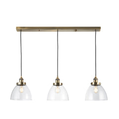image cut out on white background of three-drop antique brass lights