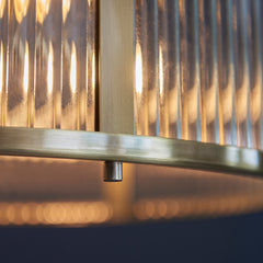 close up image of antique brass metalwork of pendant light