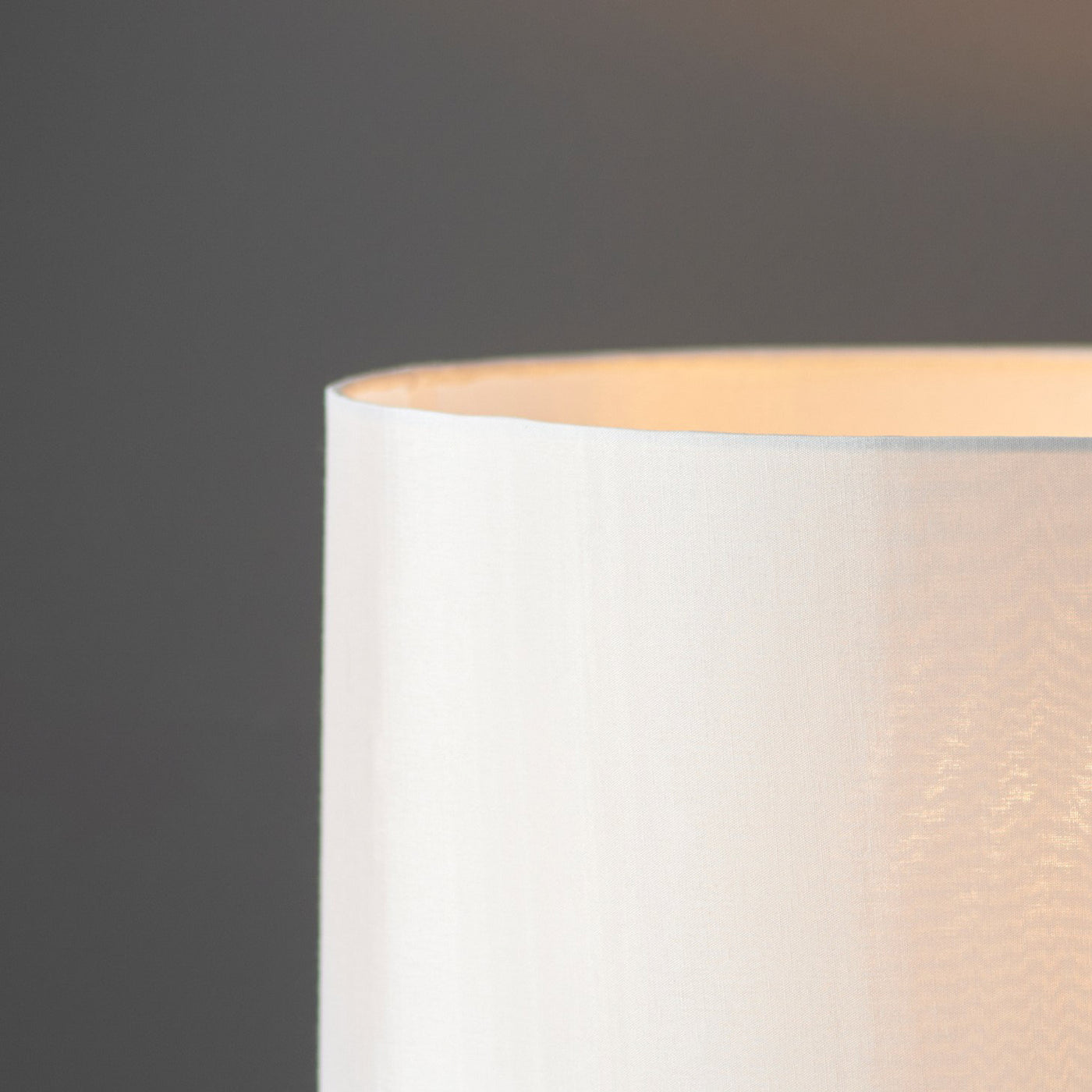 close up on linen shade of gold champagne lamp