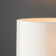 close up on linen shade of gold champagne lamp