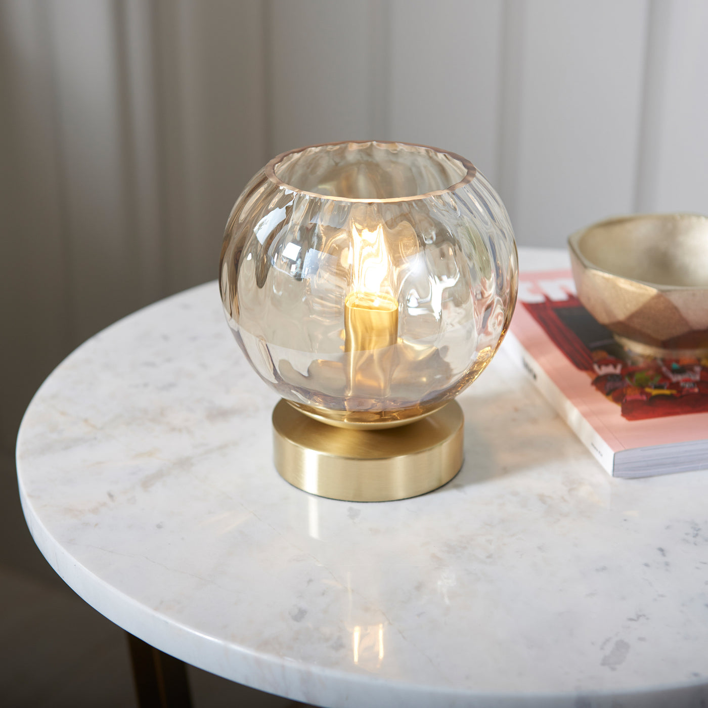 image of domed dimpled glass champagne coloured table light
